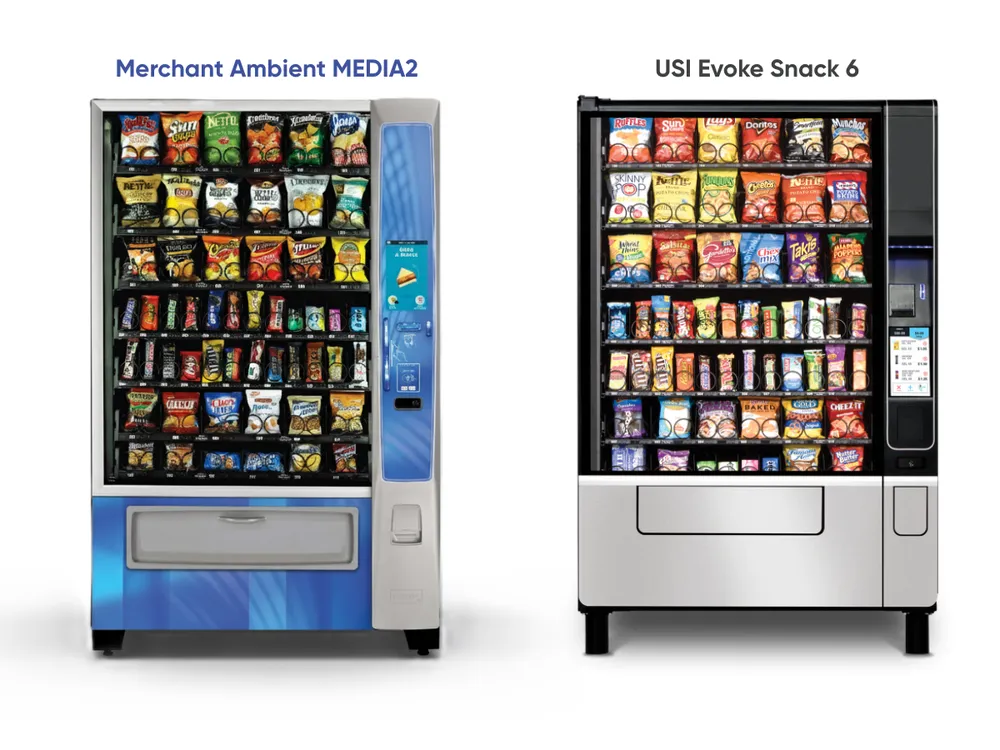 This image shows two modern snack vending machines side by side. The one on the left is a blue and white Merchant Ambient MEDIA2 machine with a large touch screen panel and a sleek design. The one on the right is a silver and black USI Evoke Snack 6 machine with a more traditional keypad and display. Both machines are full of a wide variety of snacks.